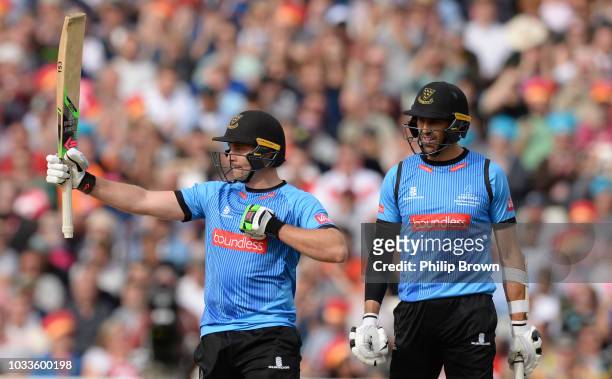 Luke Wright of Sussex celebrates reaching his half century during the Vitality T20 Blast second semi-final between Sussex Sharks and Somerset at...