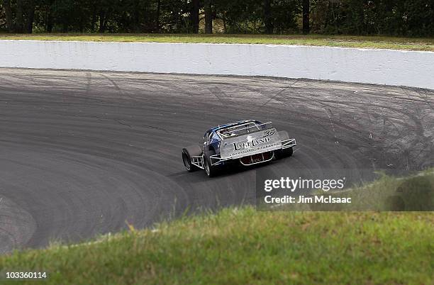 Gary McDonald, driver of the Lakeland Landscape/TRC Electric Chevrolet, drives during practice for the NASCAR Whelen Modified Tour on August 12, 2010...