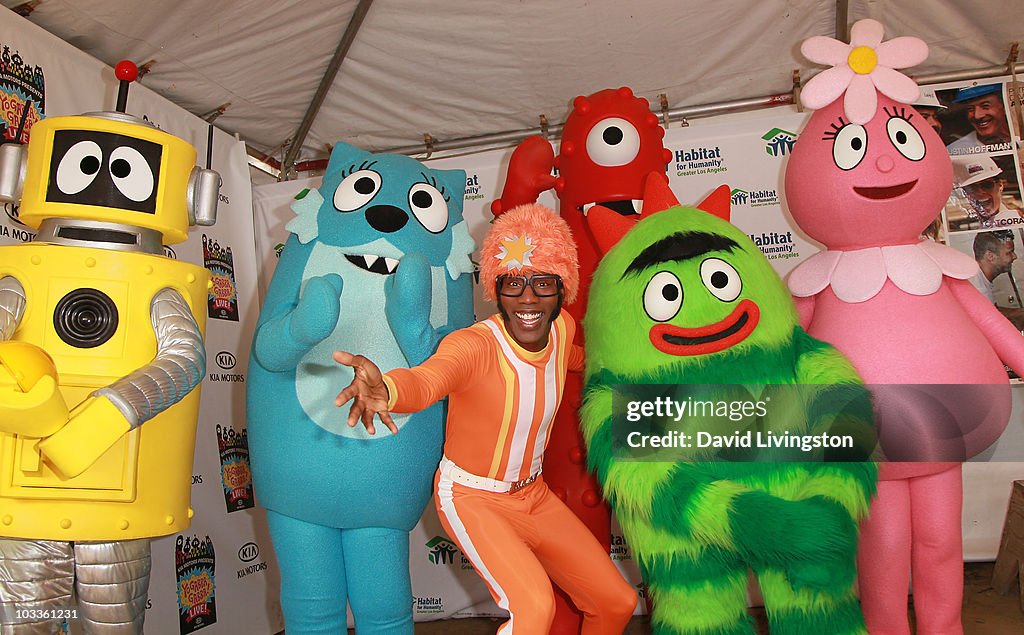 Jordan Riley Gabba Actor Lance Robertson aka DJ Lance Rock poses with Yo Gabba Gabba ...