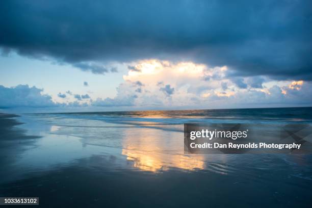 sunset on ocean beach - jacksonville florida stock-fotos und bilder
