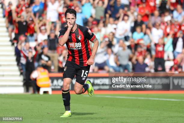 Adam Smith of AFC Bournemouth celebrates after scoring his team's fourth goal during the Premier League match between AFC Bournemouth and Leicester...