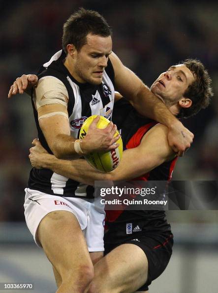 Kyle Hardingham Nathan Brown of the Magpies is tackled by Kyle Hardingham of the ...