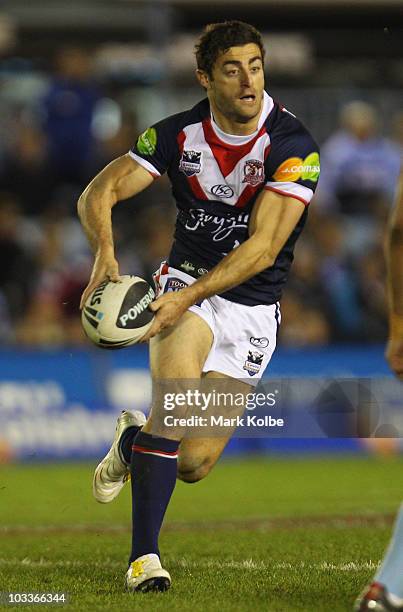 Anthony Minichiello of the Roosters runs the ball during the round 23 NRL match between the Cronulla Sharks and the Sydney Roosters at Toyota Stadium...