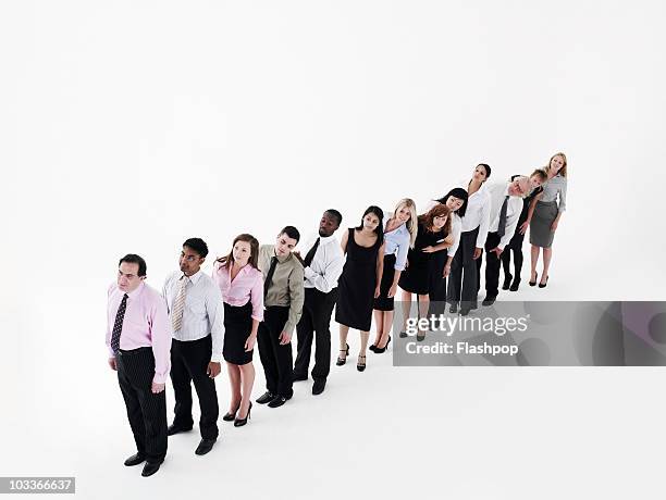 group of business people standing in a line - people in a row stock pictures, royalty-free photos & images