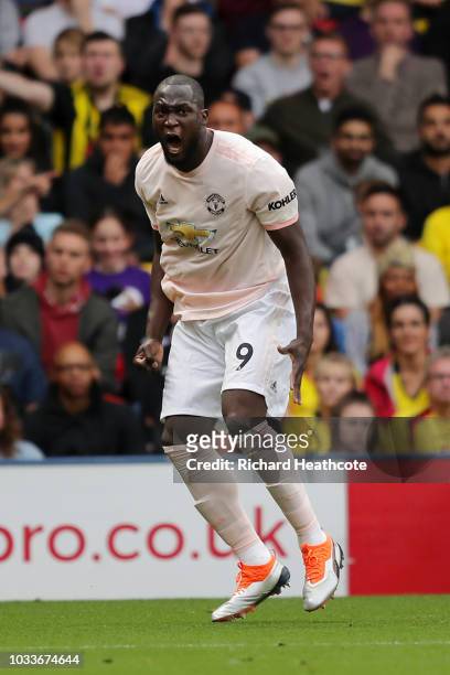 Romelu Lukaku of Manchester United celebrates after scoring his team's first goal during the Premier League match between Watford FC and Manchester...