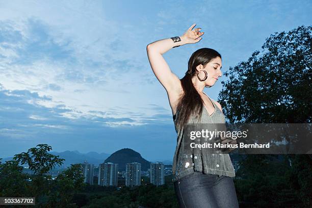 woman dancing at night on a roof top party. - 60161 imagens e fotografias de stock