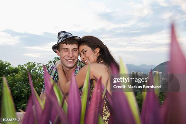 happy couple looking for some privacy at roof top. - 60161 imagens e fotografias de stock