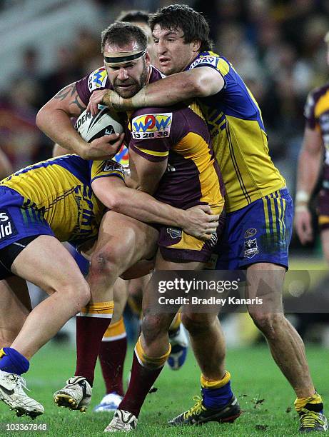 Scott Anderson of the Broncos takes on the defence during the round 23 NRL match between the Brisbane Broncos and the Parramatta Eels at Suncorp...