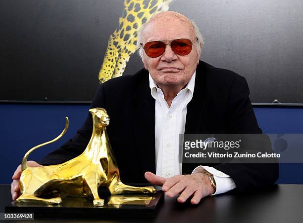 Director Francesco Rosi poses with the Career Achievement Pardo during the 63rd Locarno Film Festival on August 13, 2010 in Locarno, Switzerland.