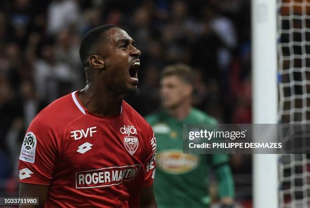 Dijon's French forward Wesley Said celebrates after scoring during the French L1 football match between Dijon FCO and SCO Angers on September 15 at...