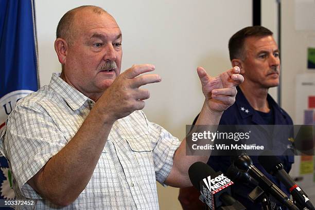 National Incident Commander Thad Allen briefs members of the press with Coast Guard Rear Adm. Paul Zukunft at the Houma Incident Command Post August...