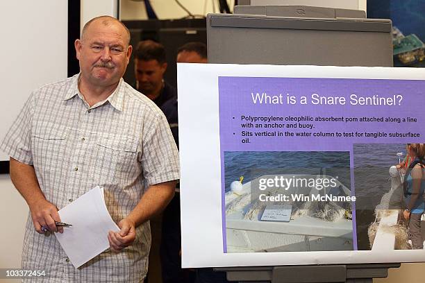 National Incident Commander Thad Allen arrives to brief members of the press at the Houma Incident Command Post August 13, 2010 in Schriever,...