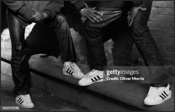 Close-up view of the Adidas sneakers worn by Run DMC's Joseph "Run" Simmons and Darryl "D.M.C." McDaniels, New York, early 1980s.