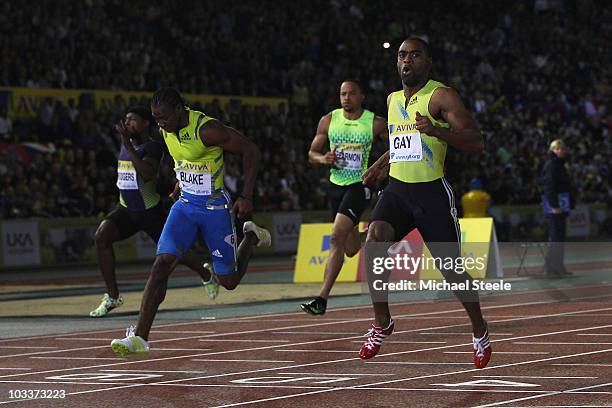 Tyson Gay of USA wins the men's 100m in 9.78 seconds from Yohan Blake of Jamaica during the Aviva London Grand Prix meeting at Crystal Palace on...