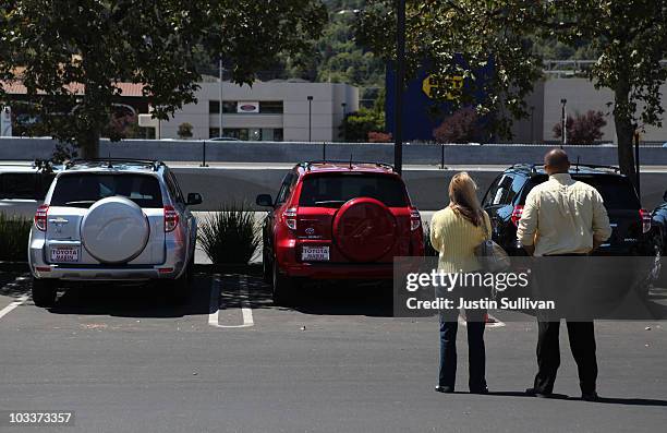 Annie Ellicott looks at a new Toyotas with salesman Kapone Molina at Toyota of Marin August 13, 2010 in San Rafael, California. U.S. Retail sales...