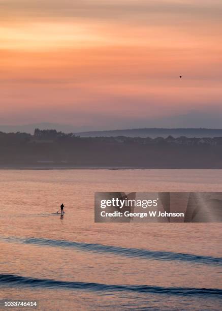 riding the waves #1 - scarborough uk stock-fotos und bilder