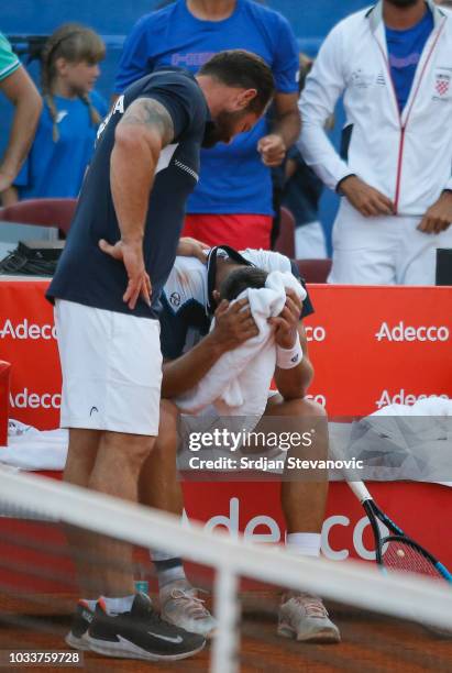 Team captain Zeljko Krajan of Croatia talks to Mate Pavic after doubles match on day two of the Davis Cup World Group semi final doubles match...