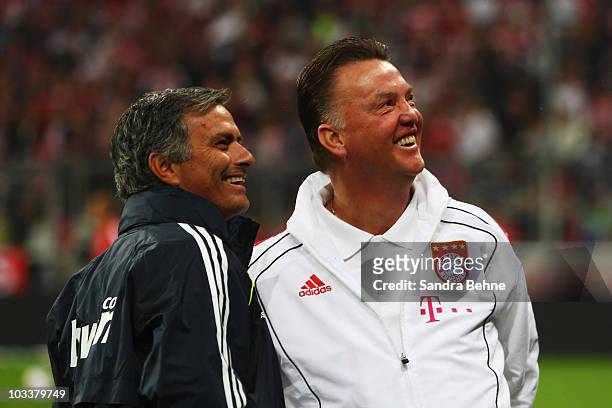 Louis van Gaal of Bayern Muenchen and Jose Mourinho of Real Madrid smile prior to the Franz Beckenbauer Farewell match between FC Bayern Muenchen and...