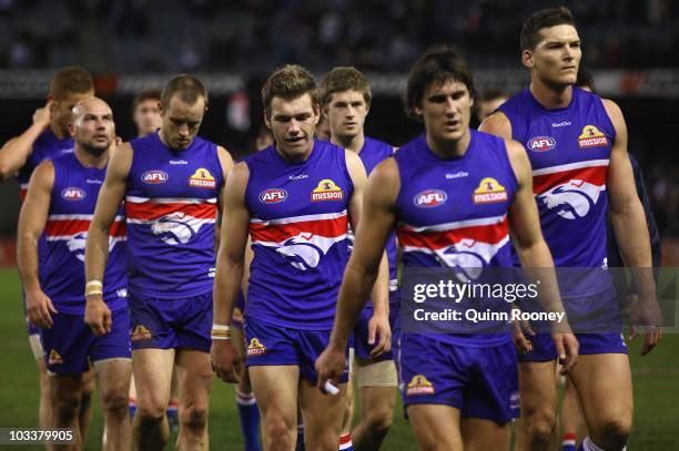 The Bulldogs leave the ground after losing the round 20 AFL match between the Western Bulldogs and the Geelong Cats at Etihad Stadium on August 14,...
