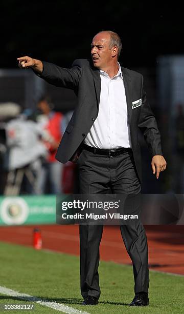 Mario Basler, head coach of Wacker Burghausen, reacts on the sideline during the DFB Cup first round match between Wacker Burghausen and Borussia...