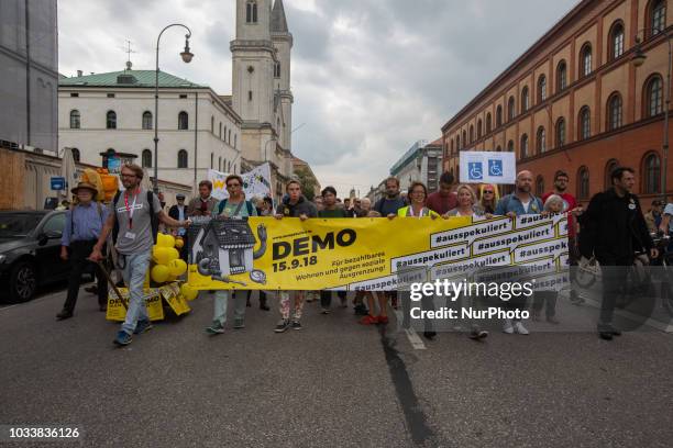 Front Banner. Among the police more than 7000 people protested under the motto #Ausspekuliert against too high rentals in Munich.