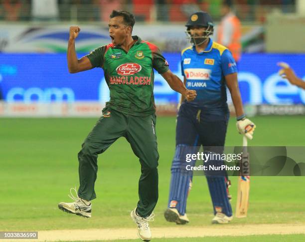 Bangladesh cricketer Rubel Hossain celebrates after taking a wicket during the first cricket match of Asia Cup 2018 between Sri Lanka and Bangladesh...