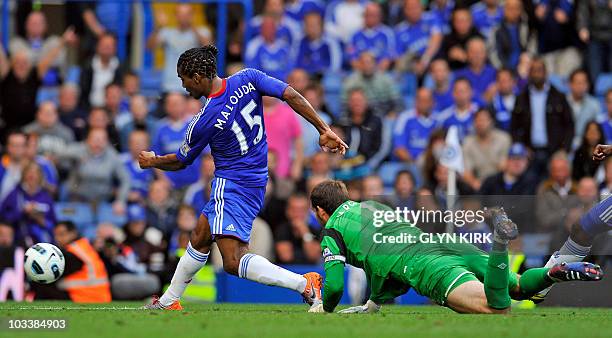 Chelsea's French midfielder Florent Malouda scores the sixth goal past West Brom's English goalkeeper Scott Carson during the English Premier League...