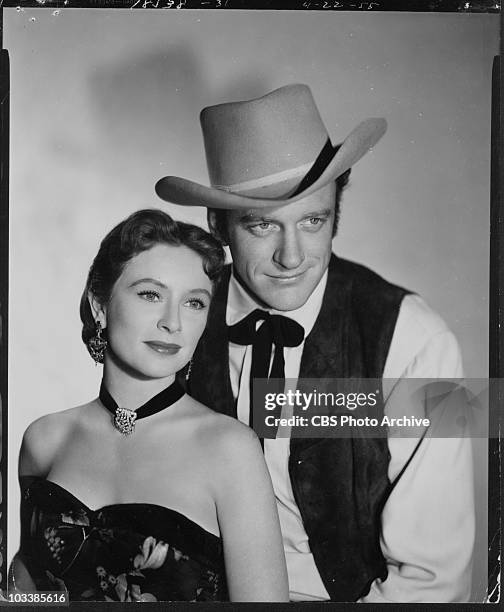 Cast members Amanda Blake and James Arness . April 22, 1955.