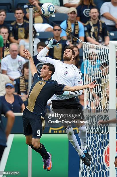 Matt Pickens of the Colorado Rapids punches the ball away from Sebastien Le Toux of the Philadelphia Union at PPL Park on August 14, 2010 in Chester,...