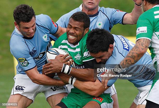 Lote Raikabula of Manawatu is tackled during the round three ITM Cup match between Northland and Manawatu at Toll Stadium on August 15, 2010 in...
