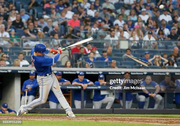 Aledmys Diaz of the Toronto Blue Jays connects on a seventh inning broken bat two run single against the New York Yankees at Yankee Stadium on...