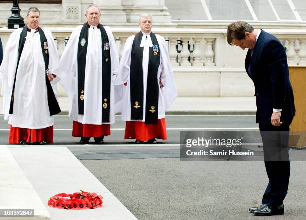 Prime Minister David Cameron lays a wreath at a memorial service at the Cenotaph to mark the VJ Day 65th Anniversary on August 15, 2010 in London,...