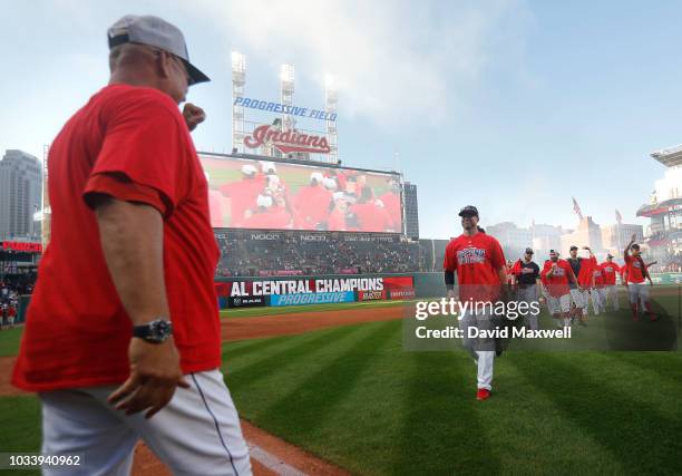 Cleveland Indians Manager Terry Francona congratulates players as they walk off the field during a post game celebration after the Indians defeated...