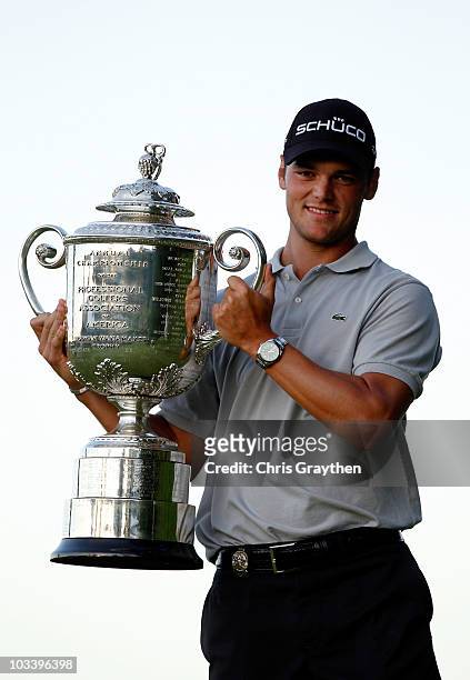 Martin Kaymer of Germany poses with the Wanamaker Trophy after defeating Bubba Watson during the three-hole aggregate playoff at the 92nd PGA...