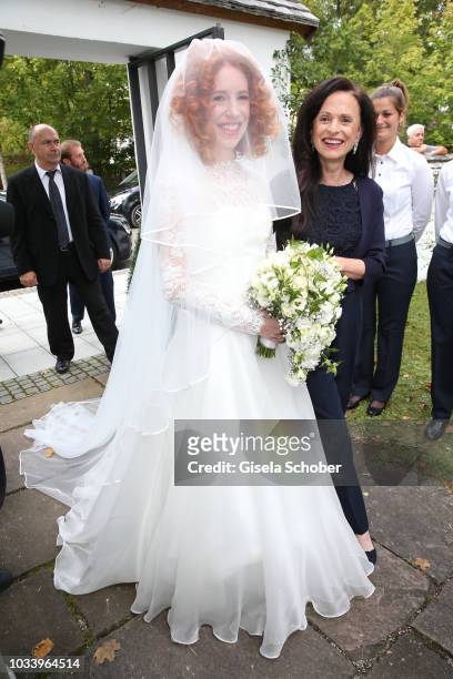 Bride Laura Kaefer and her mother Sylvia during the church wedding of Ralph Siegel and Laura Kaefer at the protestant church Thomaskirche Gruenwald...