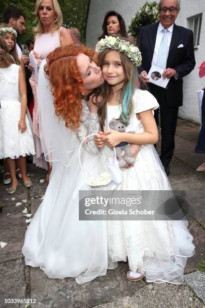 Bride Laura Kaefer and her daughter Ruby Vivian Kaefer during the church wedding of Ralph Siegel and Laura Kaefer at the protestant church...