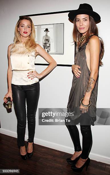 Amber Heard and Tasya Van Ree attend photographer Tasya Van Ree's new exhibition "Untitled Project" opening at the Celebrity Vault on August 11, 2010...