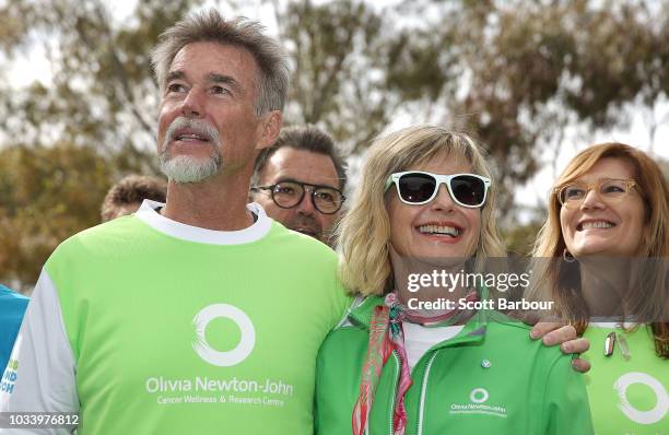 Olivia Newton-John and her husband John Easterling look on during the annual Wellness Walk and Research Runon September 16, 2018 in Melbourne,...