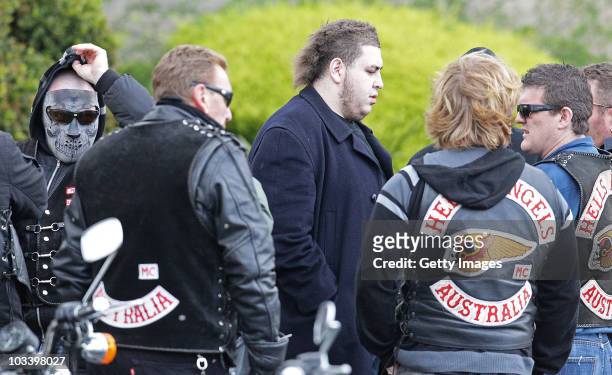 Omar Chaouk , the son of Macchour Chaouk talks to Hells Angels bikies after the funeral for Melbourne crime figure Macchour Chaouk at Preston Mosque...