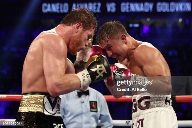 Gennady Golovkin punches Canelo Alvarez during their WBC/WBA middleweight title fight at T-Mobile Arena on September 15, 2018 in Las Vegas, Nevada.