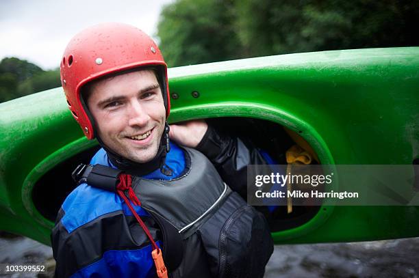 man holding kayak - life jacket photos stock pictures, royalty-free photos & images