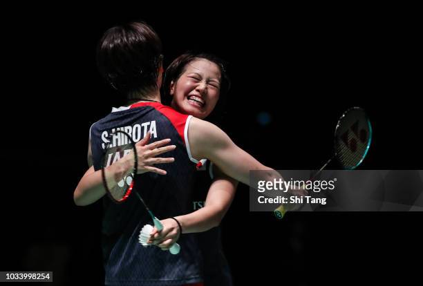 Yuki Fukushima and Sayaka Hirota of Japan celebrate the victory after their Women's Double final match against Chen Qingchen and Jia Yifan of China...