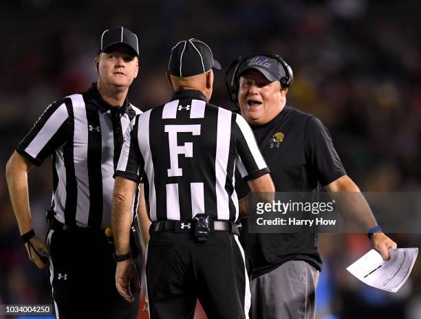 Head coach of the UCLA Bruins Chip Kelly argues a call with the officials trailing 31-14 during the third quarter against the Fresno State Bulldogs...