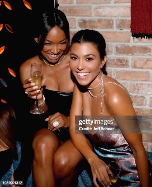 Malika Haqq and Kourtney Kardashian attend the TAO Chicago Grand Opening Celebration at TAO Chicago on September 15, 2018 in Chicago, Illinois.