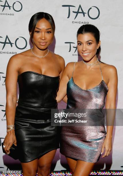 Malika Haqq and Kourtney Kardashian attend the TAO Chicago Grand Opening Celebration at TAO Chicago on September 15, 2018 in Chicago, Illinois.