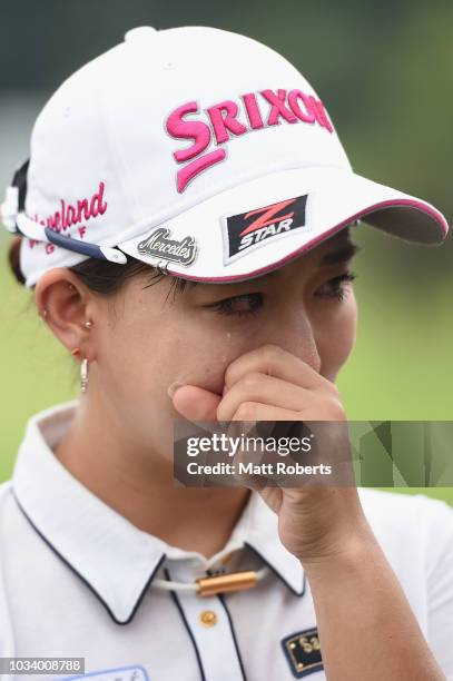 Kotono Kozuma of Japan reacts after winning the Munsingwear Ladies Tokai Classic at Shin Minami Aichi Country Club Mihama Course on September 16,...