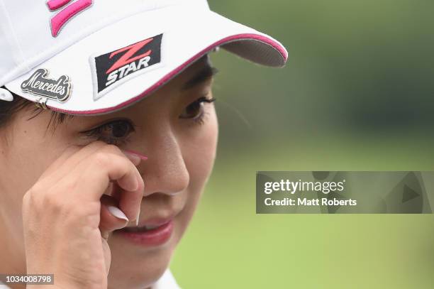 Kotono Kozuma of Japan reacts after winning the Munsingwear Ladies Tokai Classic at Shin Minami Aichi Country Club Mihama Course on September 16,...