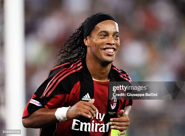 Ronaldinho of Milan celebrates after scoring the opening goal during the TIM preseason tournament at Stadio San Nicola on August 13, 2010 in Bari,...