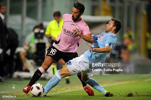 Mattia Cassani of Palermo and Luigi Vitale of Napoli compete for the ball during the match Palermo vs. Napoli during the pre season friendly...