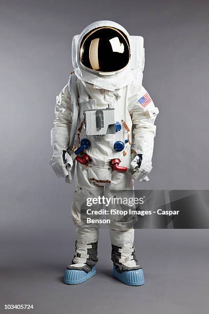 a portrait of an astronaut, studio shot - astronaut stock-fotos und bilder